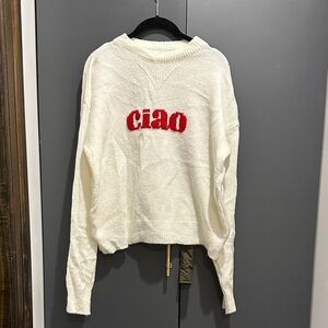 Trendy Boutique Cream Sweater with Red Accent